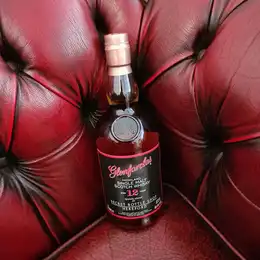 Bottle Of Glenfarclas 10 Year Old Whisky With Vibrant Red Gift Box